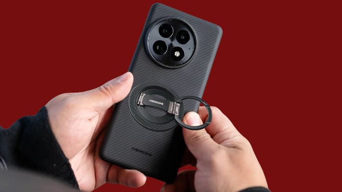 OnePlus 13 thin aramid fiber case with magnetic ring stand in red background